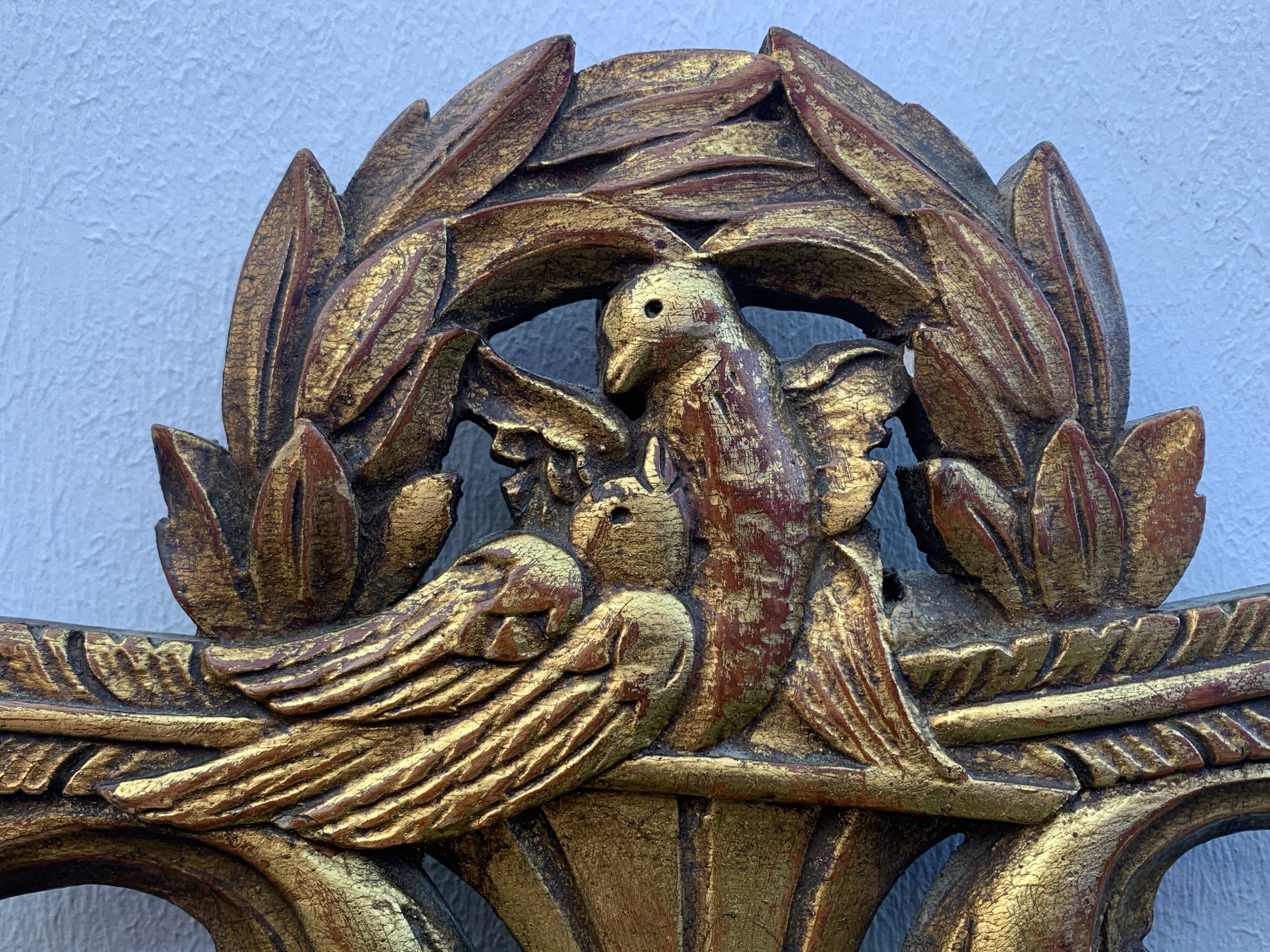 Antique mirror with gilded wood pediment, Louis XVI style