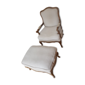 Classic armchair with its matching footrest