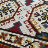 Tapis vintage en laine et frange