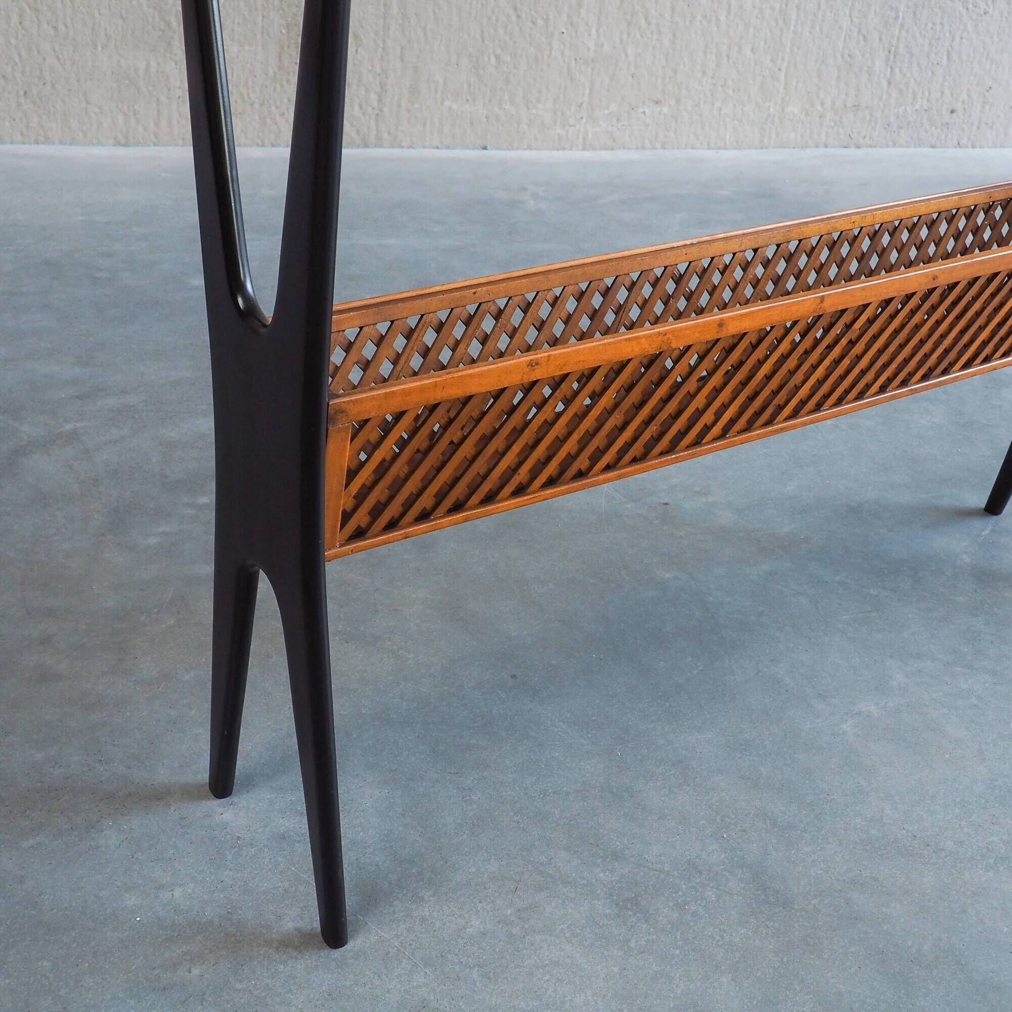 1950s Italian ebonized console table with glass top & lattice basket