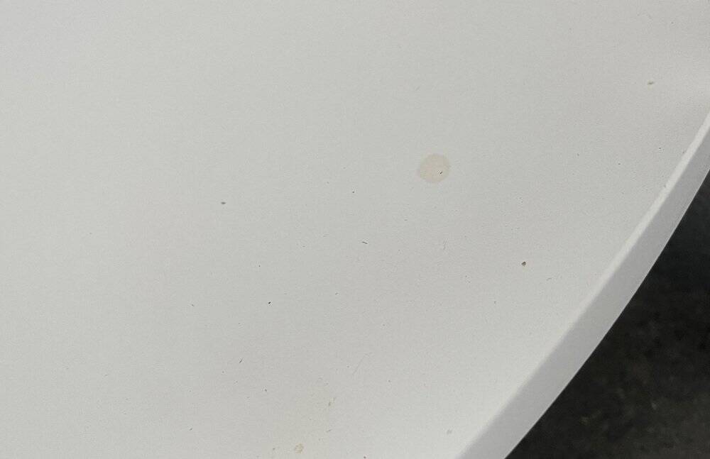 Minimalist Thrill metal coffee table or side table with wheels by Leitmotiv.