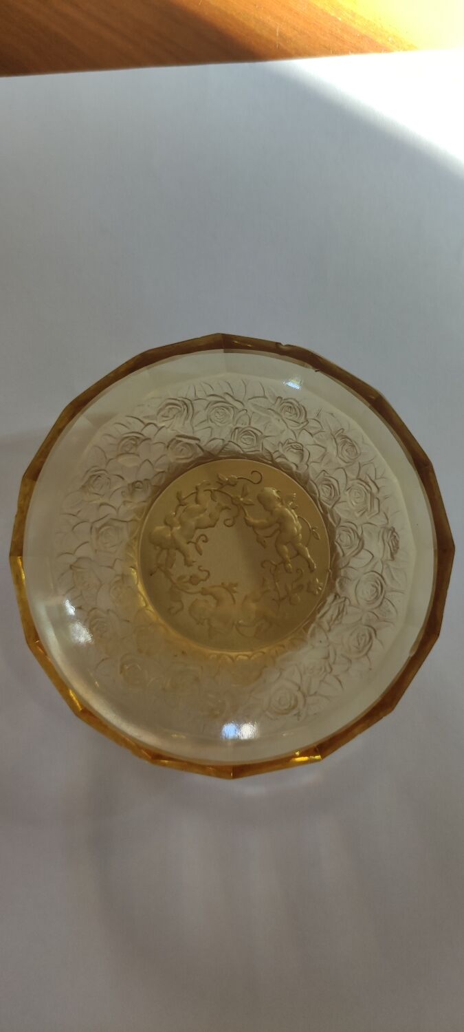 Old empty cup golden yellow glass pocket