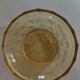 Old empty cup golden yellow glass pocket