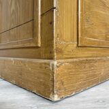 Wooden hardware cabinet painted with wood effect, circa 1940.