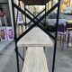 Industrial-style shelf in light wood and cast iron