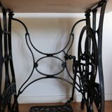 Console with new home sewing machine foot