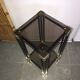 Metal square sellette and 2-storey smoked glass