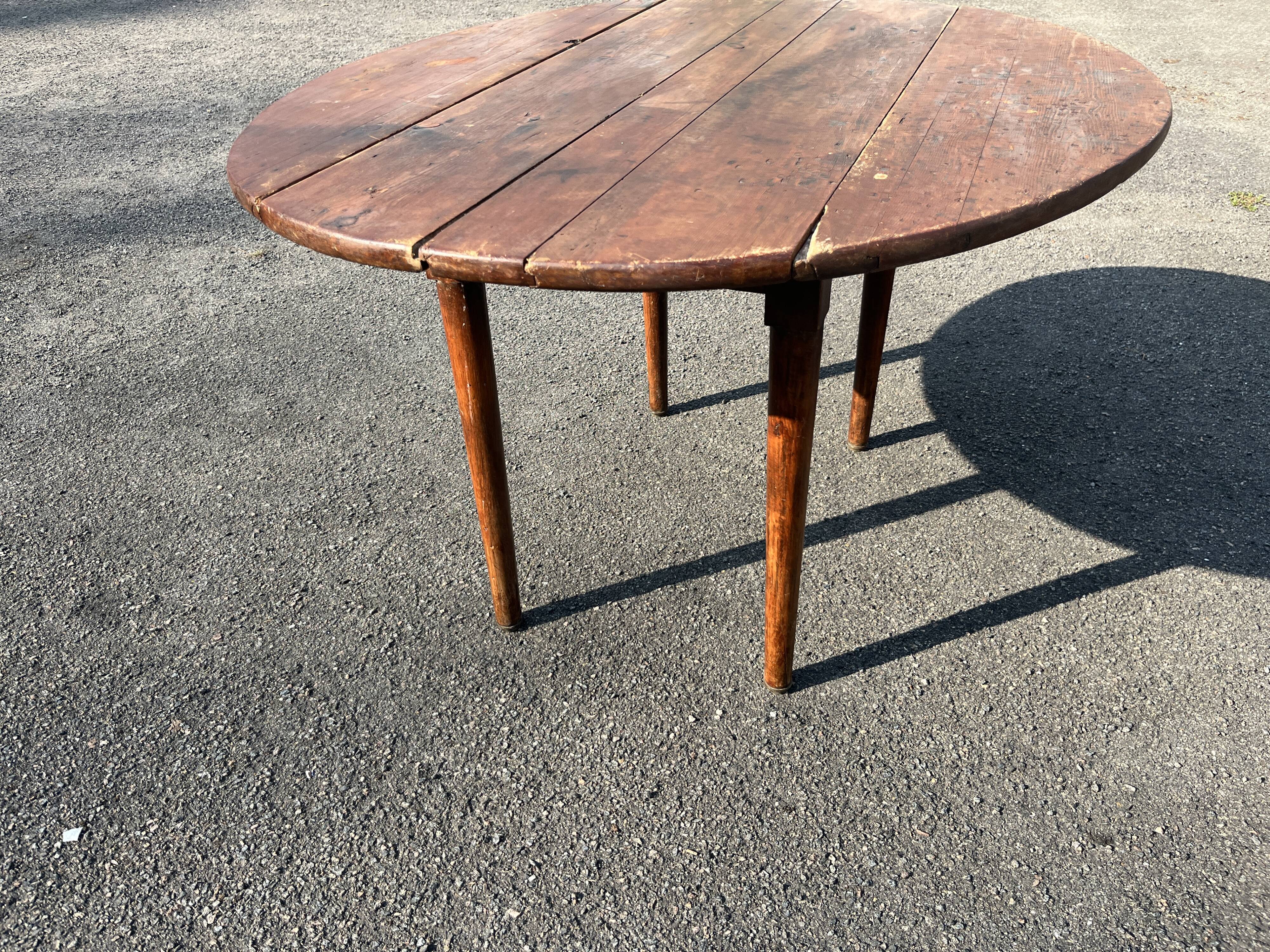 Antique rustic round wooden table 121cm, straight base