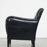 Luxurious and comfortable sheepskin armchair in a unique, stately black color