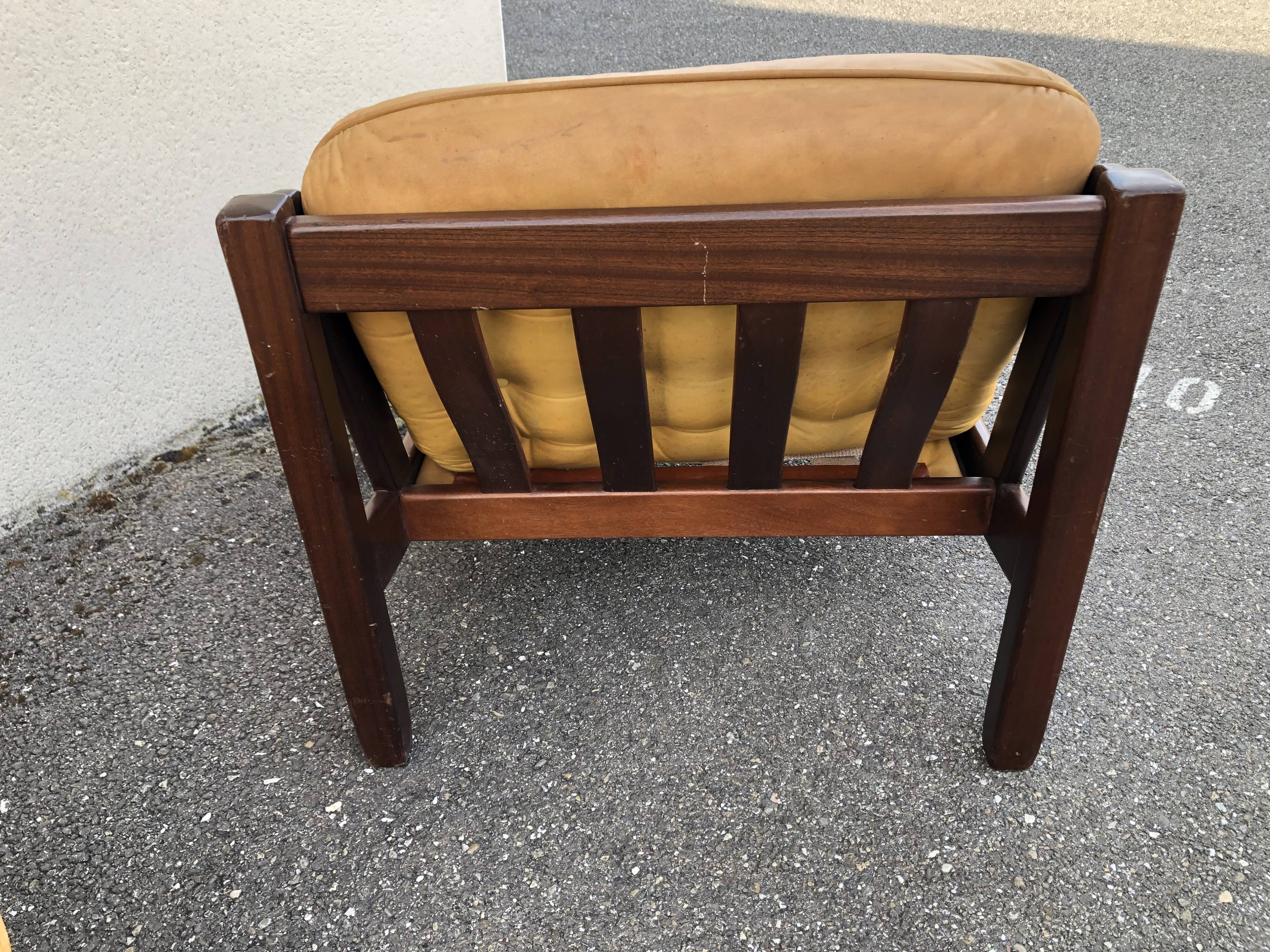 Leather and wood armchairs 70s