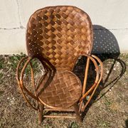 Vintage 1970s armchair in curved woven chestnut + seat cushion