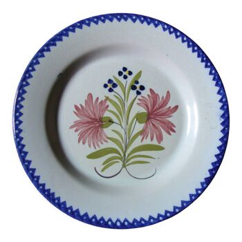 Old plate with floral decoration