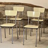 Set of 4 light yellow formica chairs
