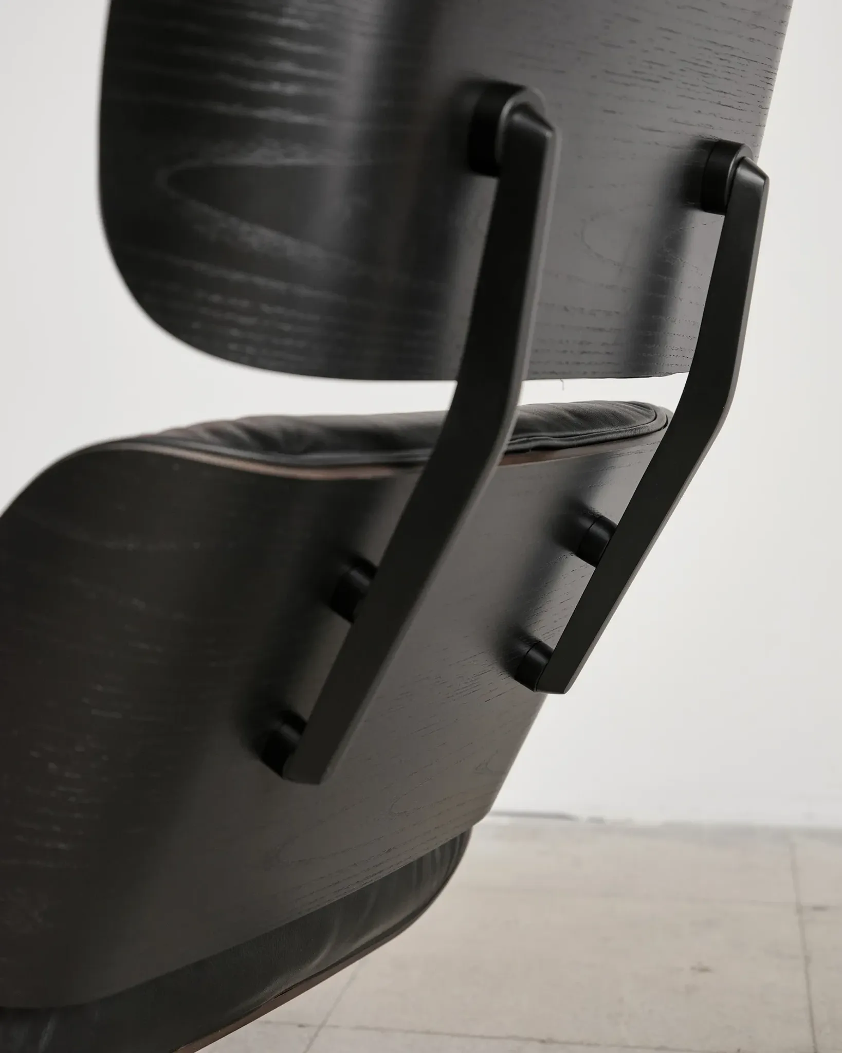 Lounge Chair and ottoman in black leather by Charles & Ray Eames, Vitra