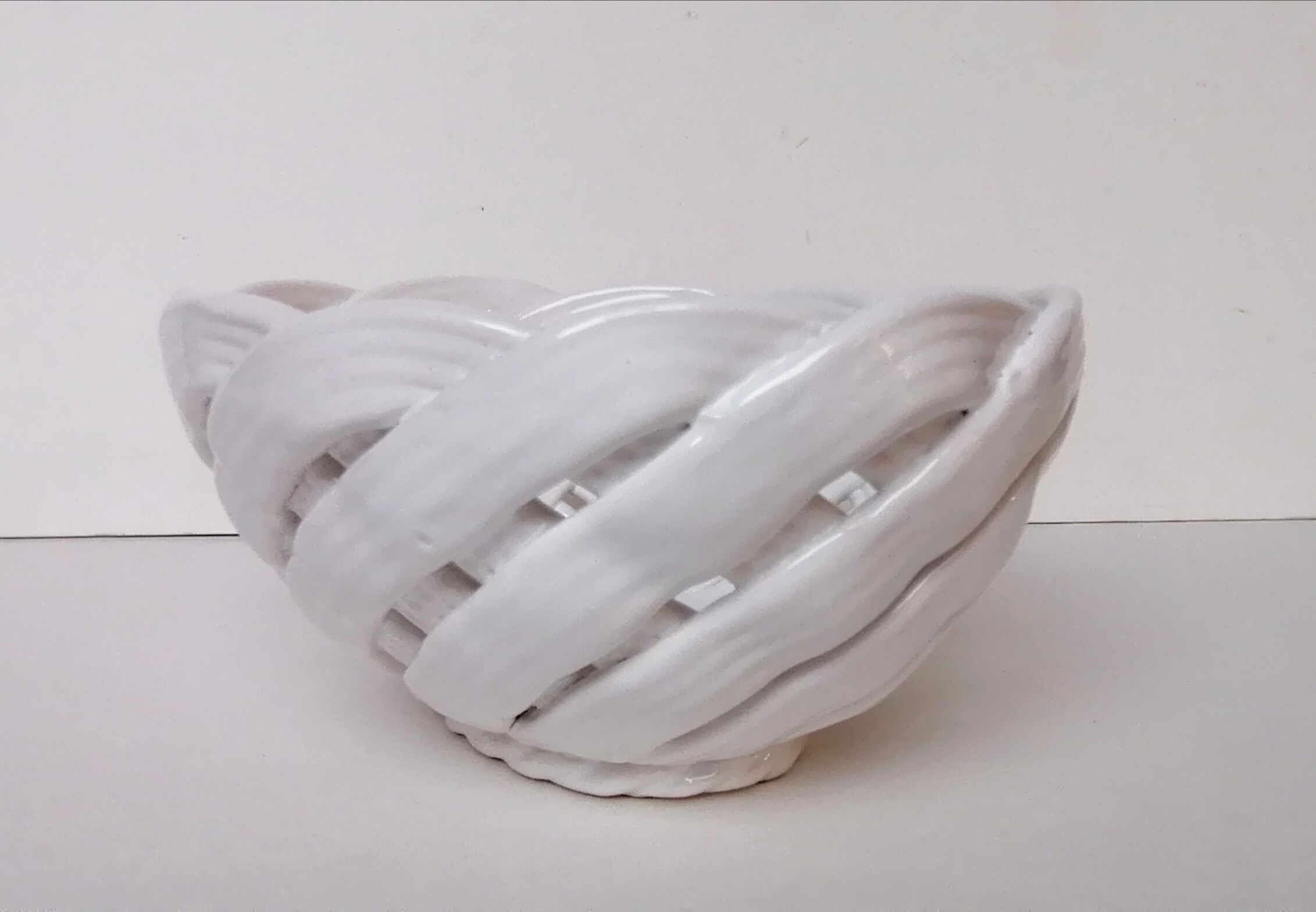White ceramic braided basket