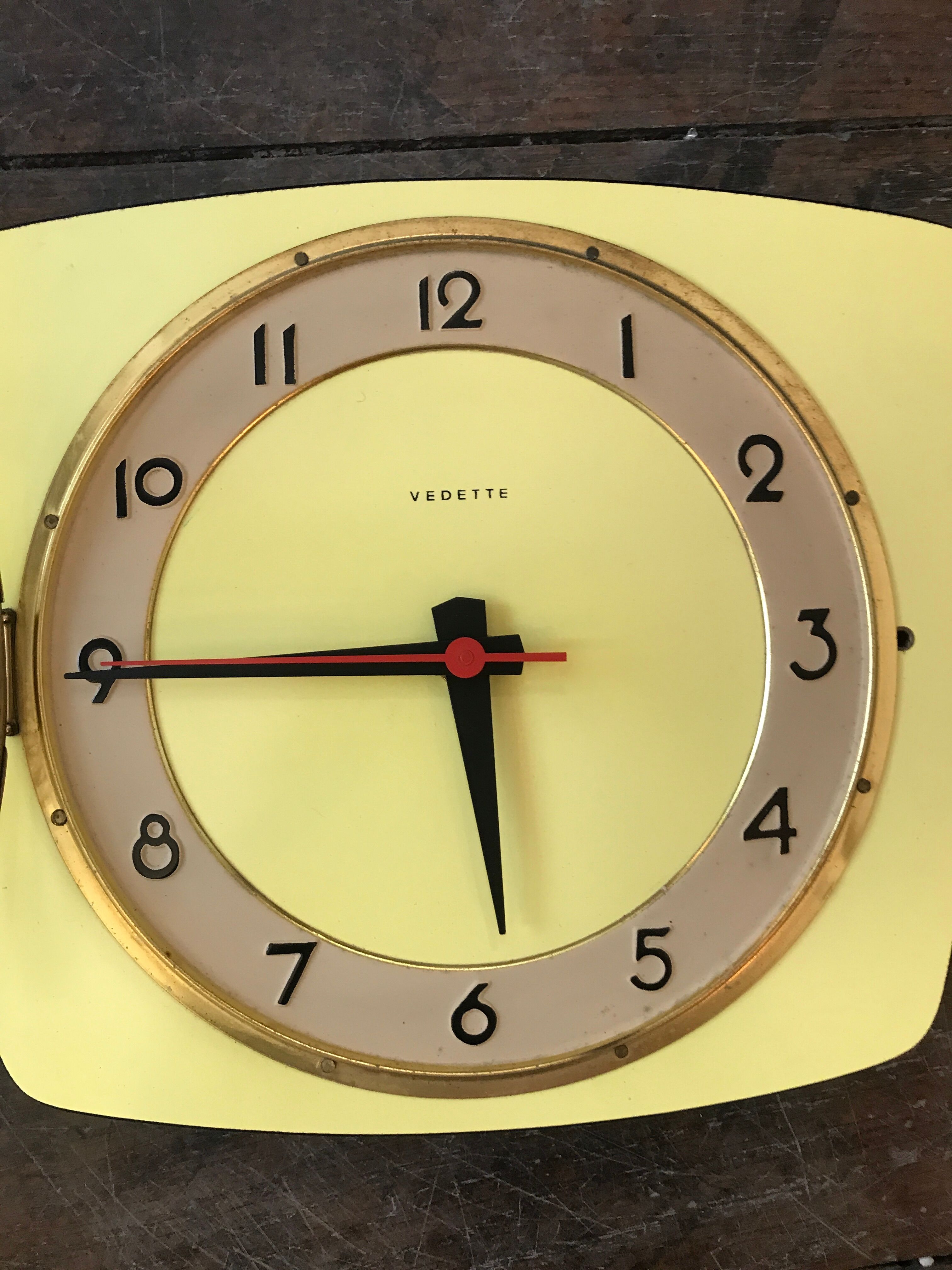 Vintage clock star Formica yellow wall pendulum