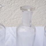 6 glass vials with glass plugs