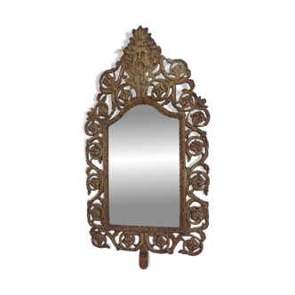 19th century beveled mirror with metal decor