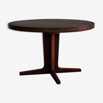 Round dining table in rosewood with extension tops