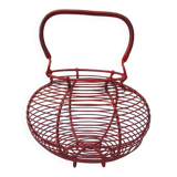 Old red-painted metal egg basket
