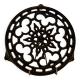 Vintage enameled cast iron trivet