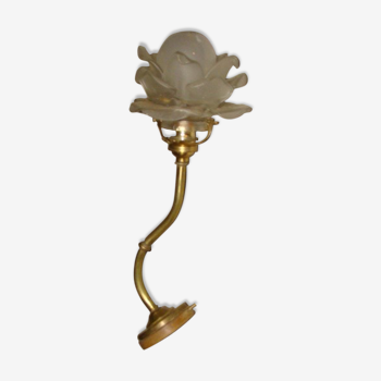 Bronze sconce with rose-shaped glass