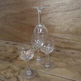 4 old aperitif glasses with transparent stem and faceted relief from the 50s and 60s