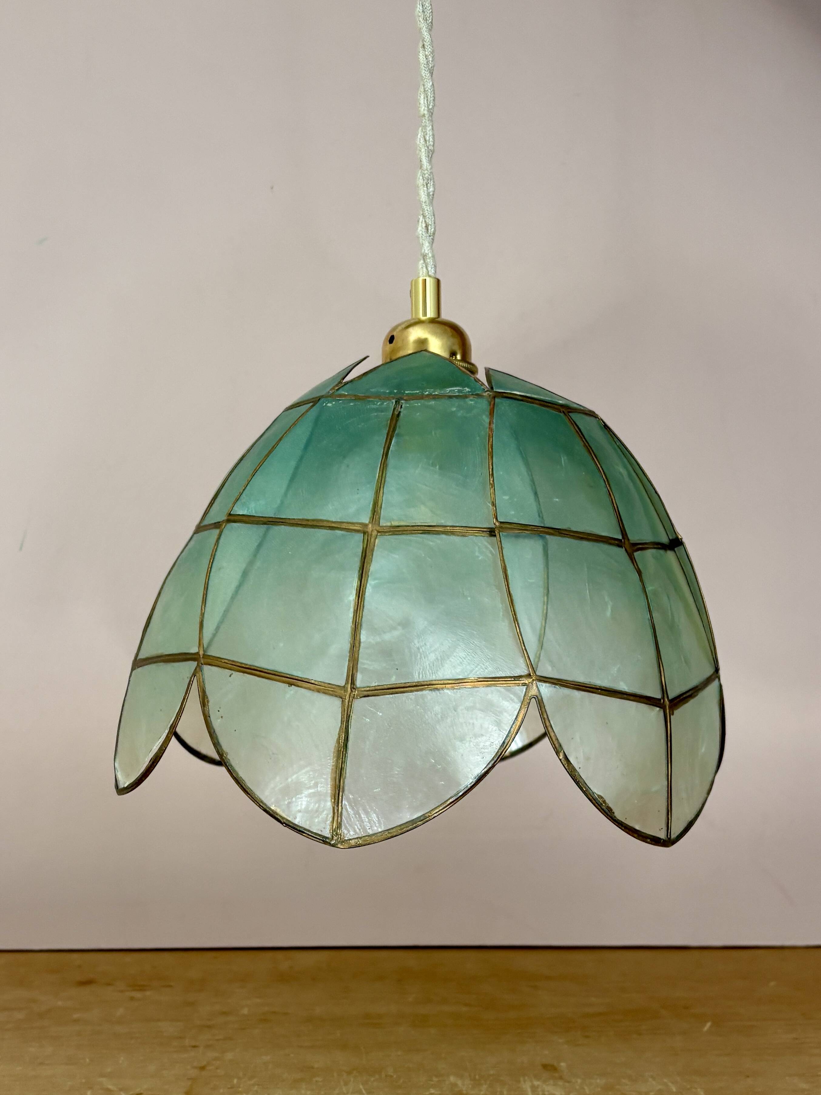 Vintage pendant light in blue mother-of-pearl and brass.