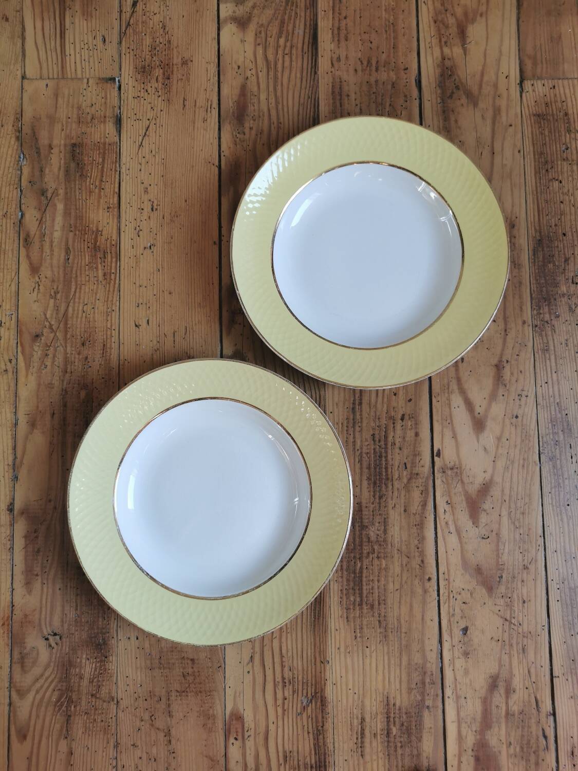 Vintage mismatched yellow and gold soup plates
