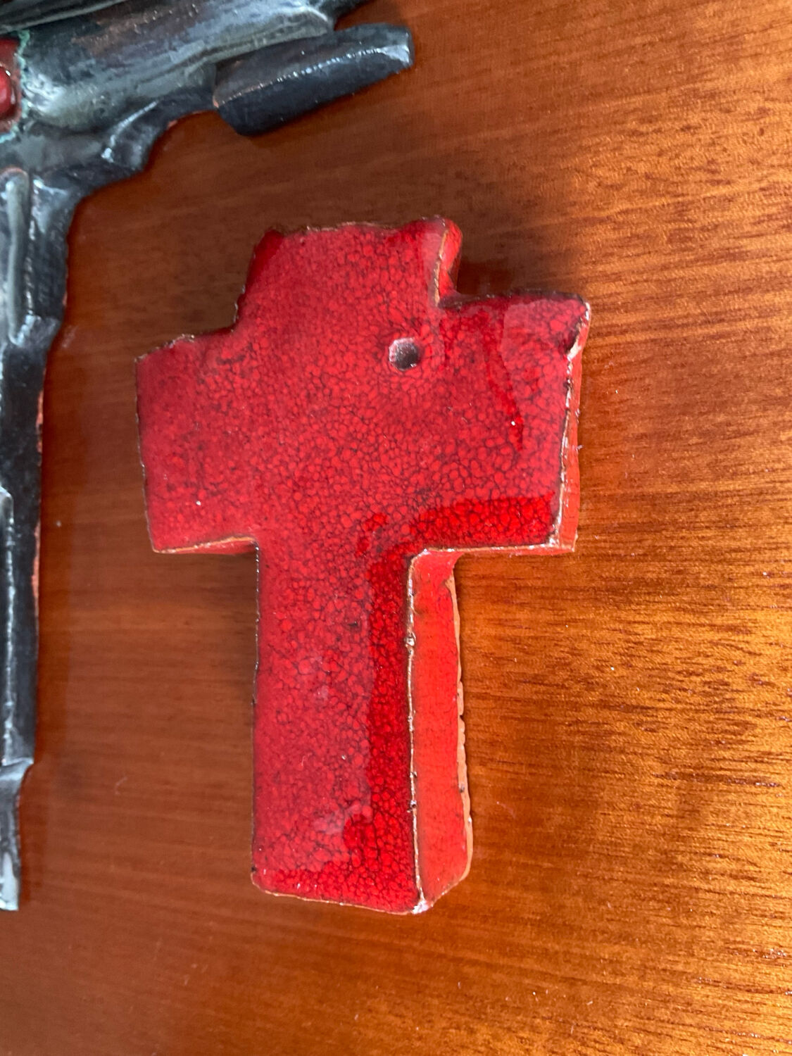 Vintage pair of glazed terracotta crosses