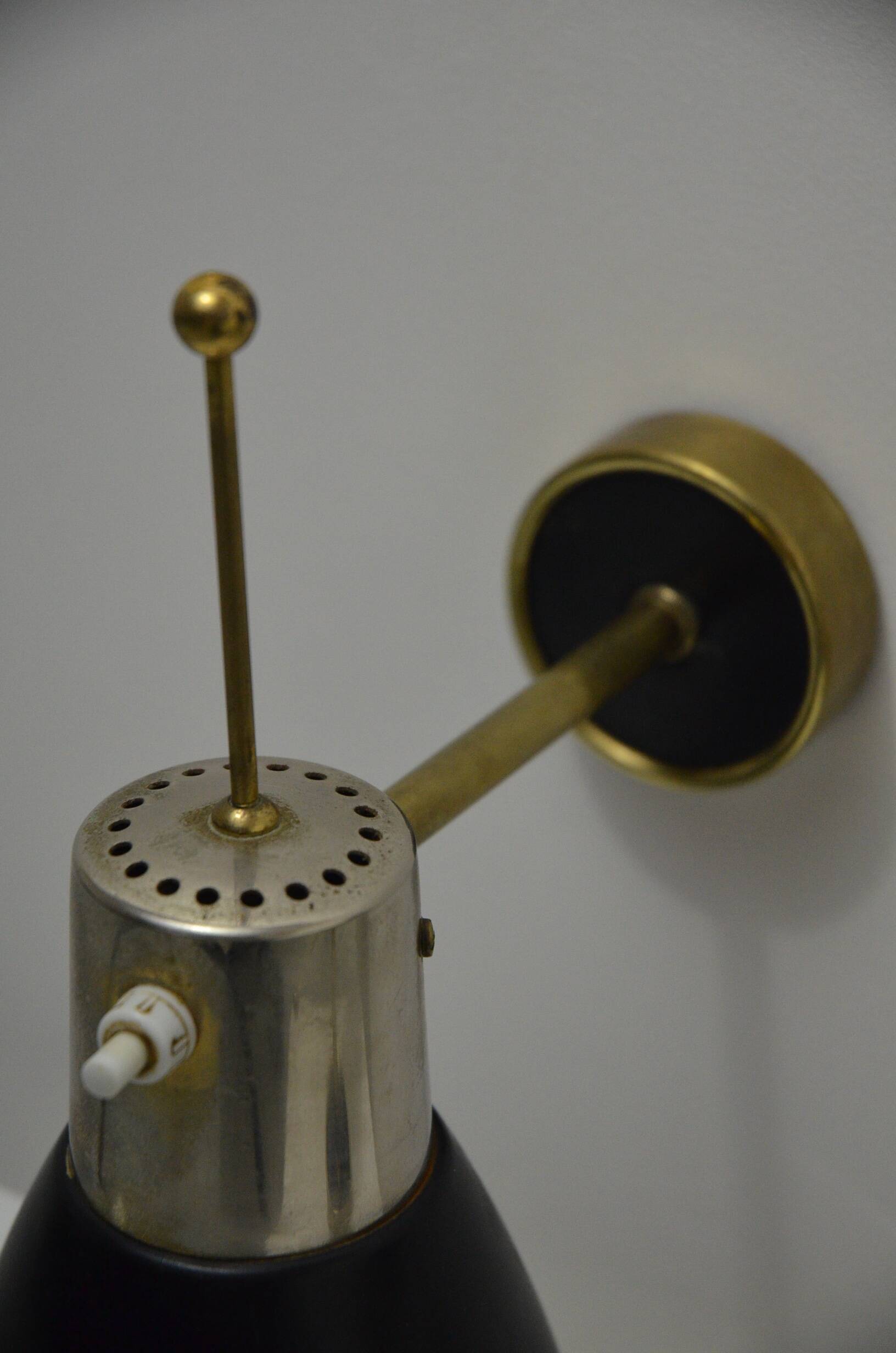 Pair of Monix wall lights in black lacquered metal and brass