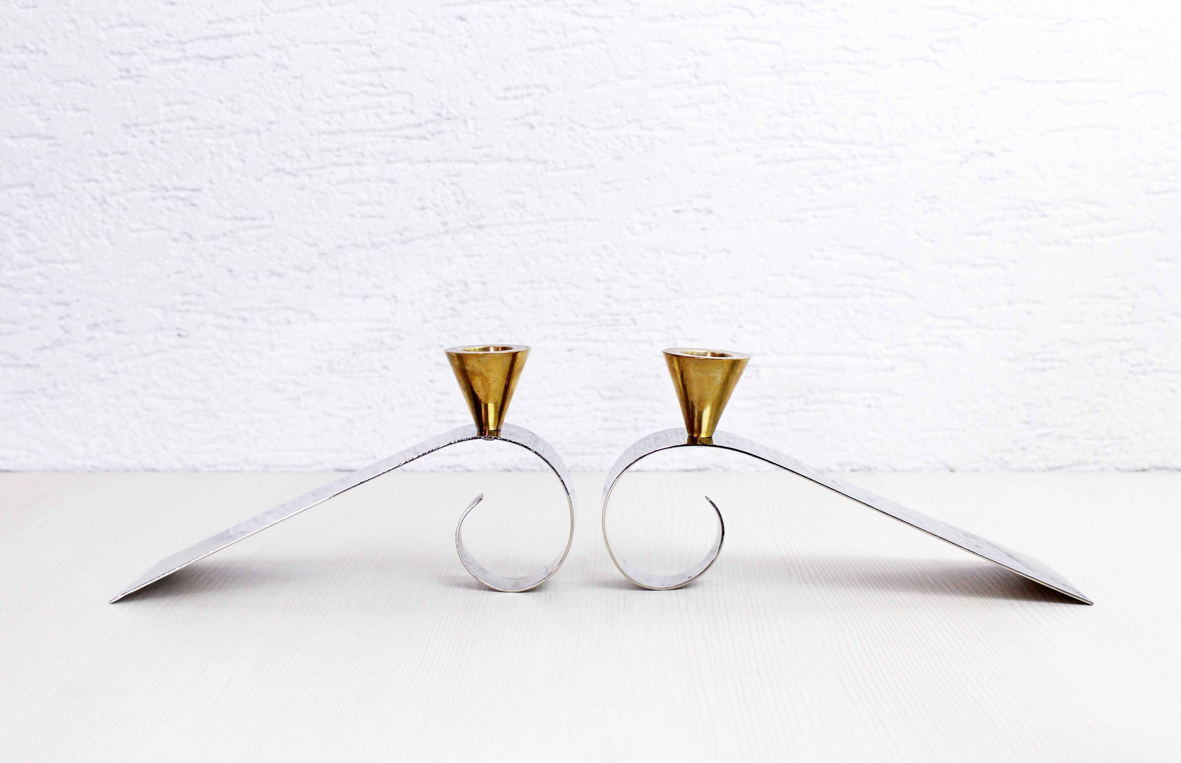 Pair of brass and chrome-plated metal candlesticks