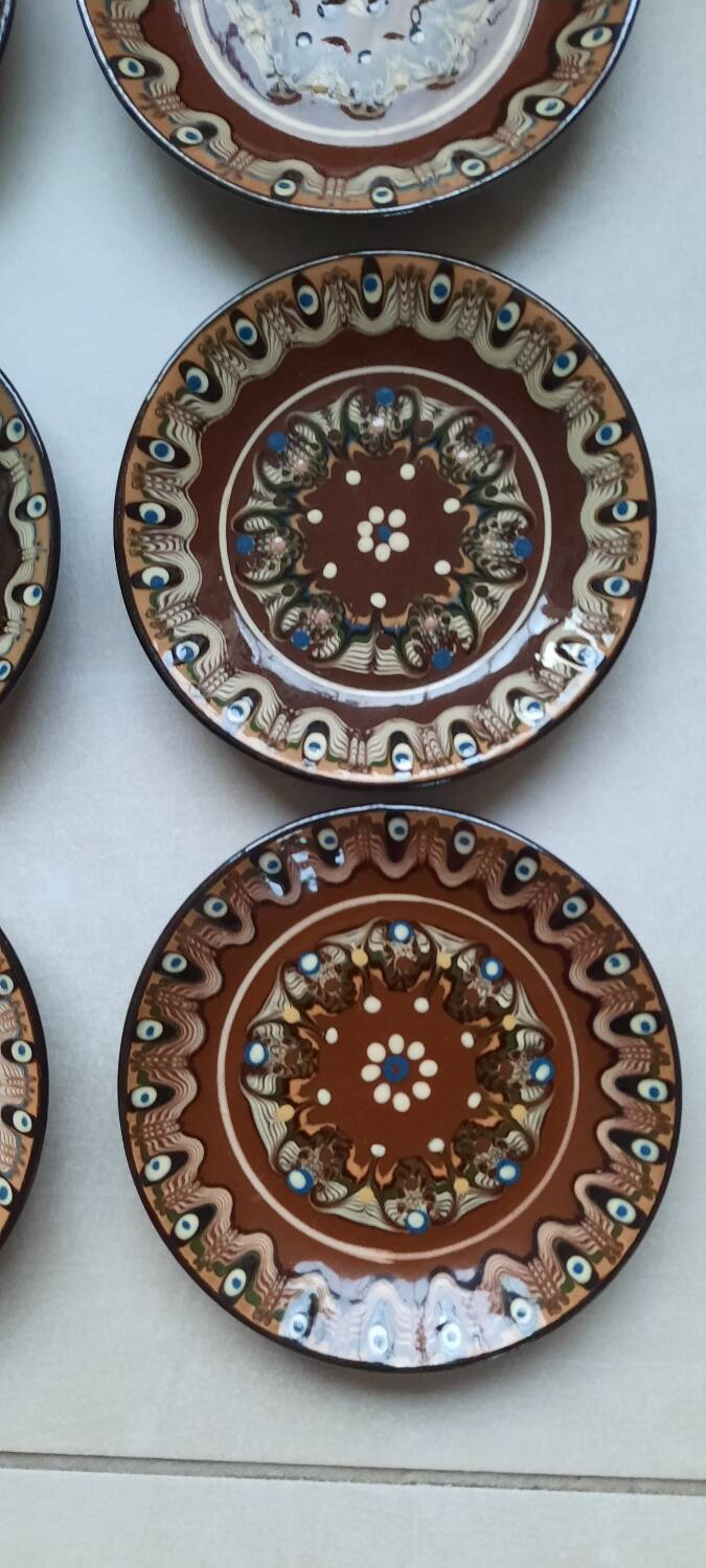Hand painted pottery plates