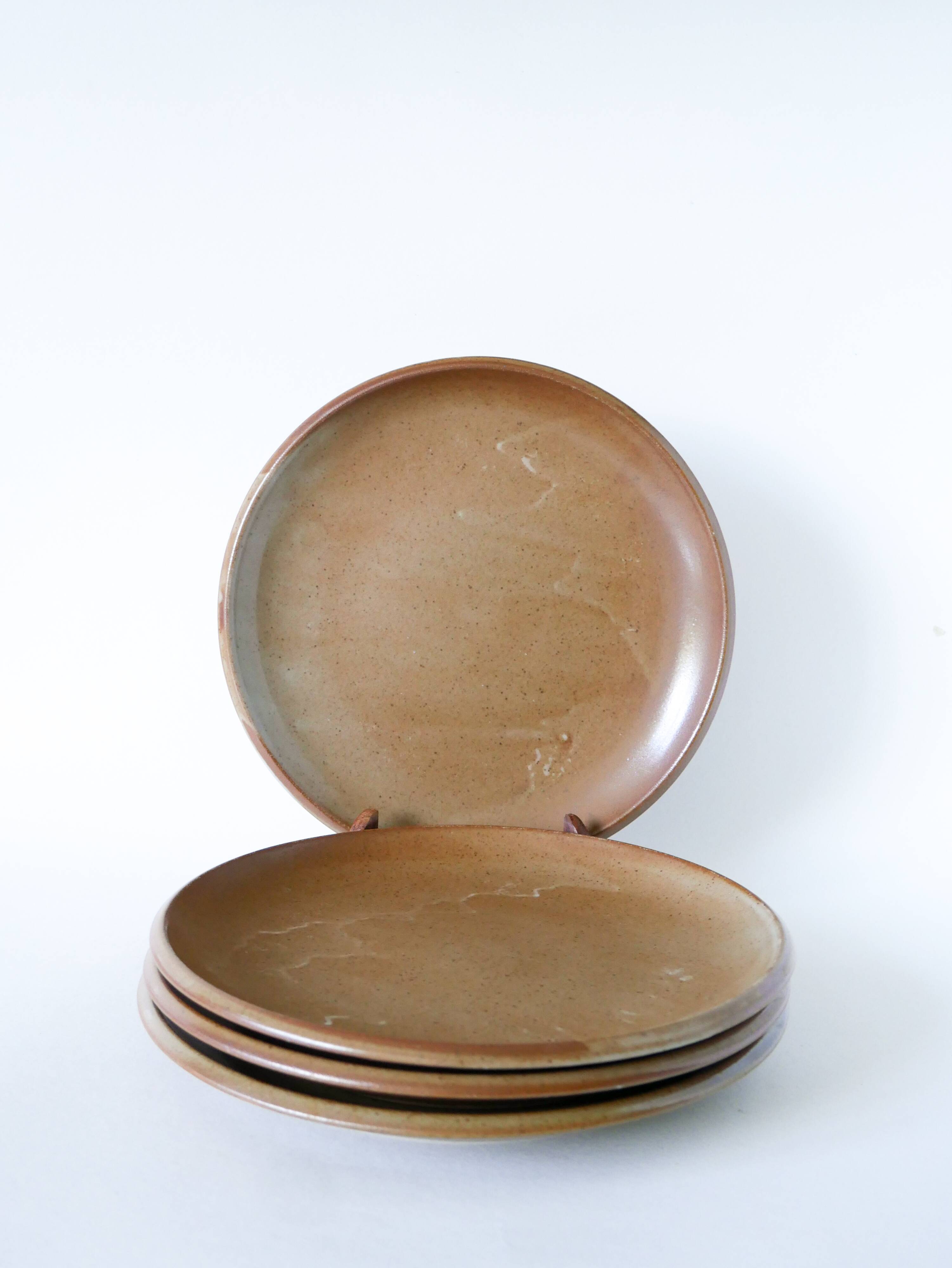 Set of 4 large flat plates in stoneware, Brenne stoneware, 1970.