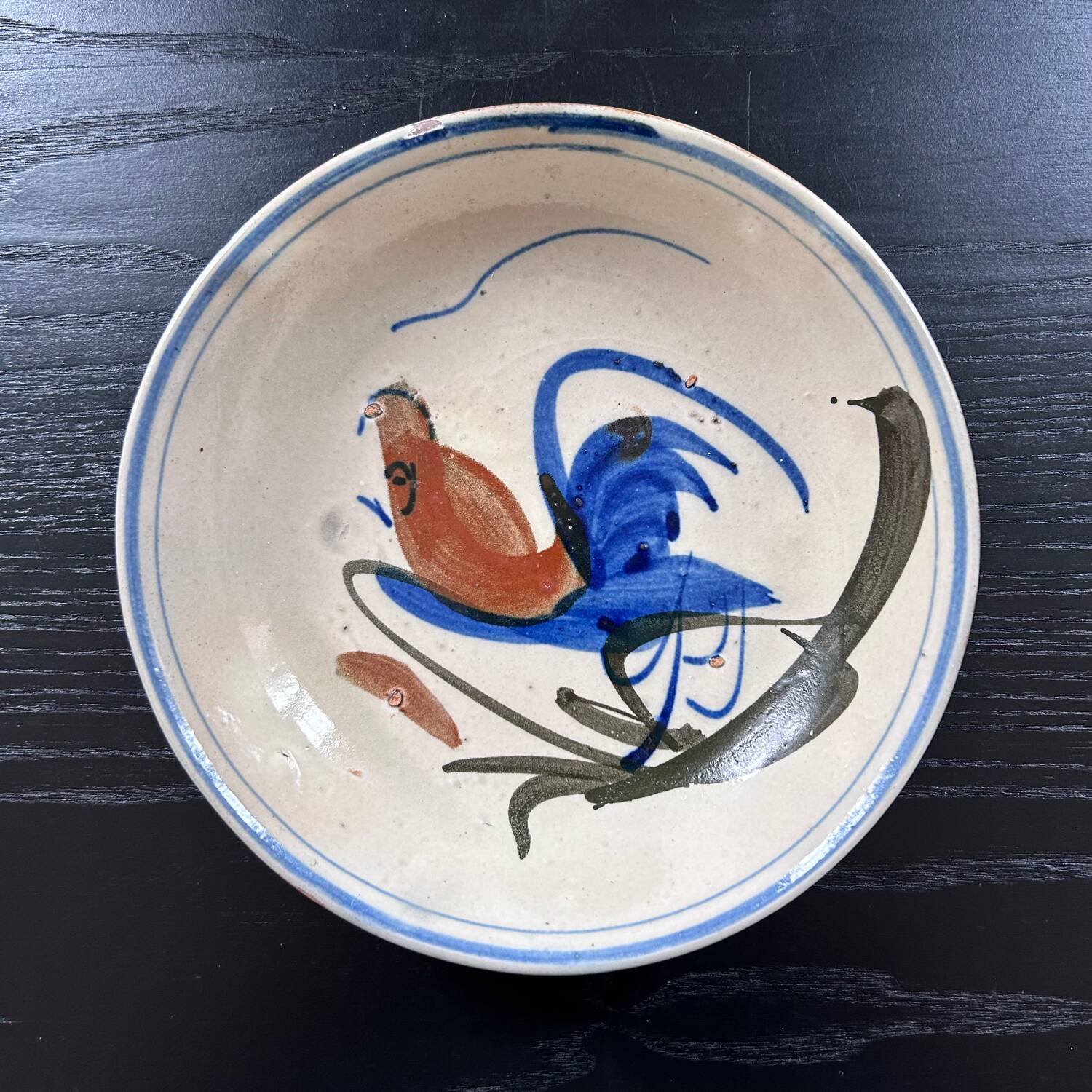 Antique dish with bird decoration