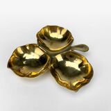 Vintage brass clover pocket emptier