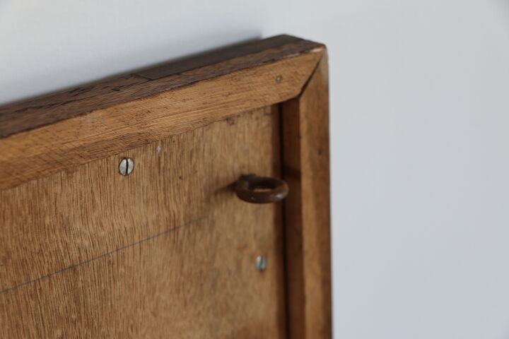 Beveled mirror grooved wood