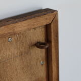 Beveled mirror grooved wood