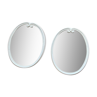Pair of oval mirrors in metal 39x49cm
