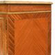 In-between furniture in marquetry decorated with a trophy decoration of musical instruments