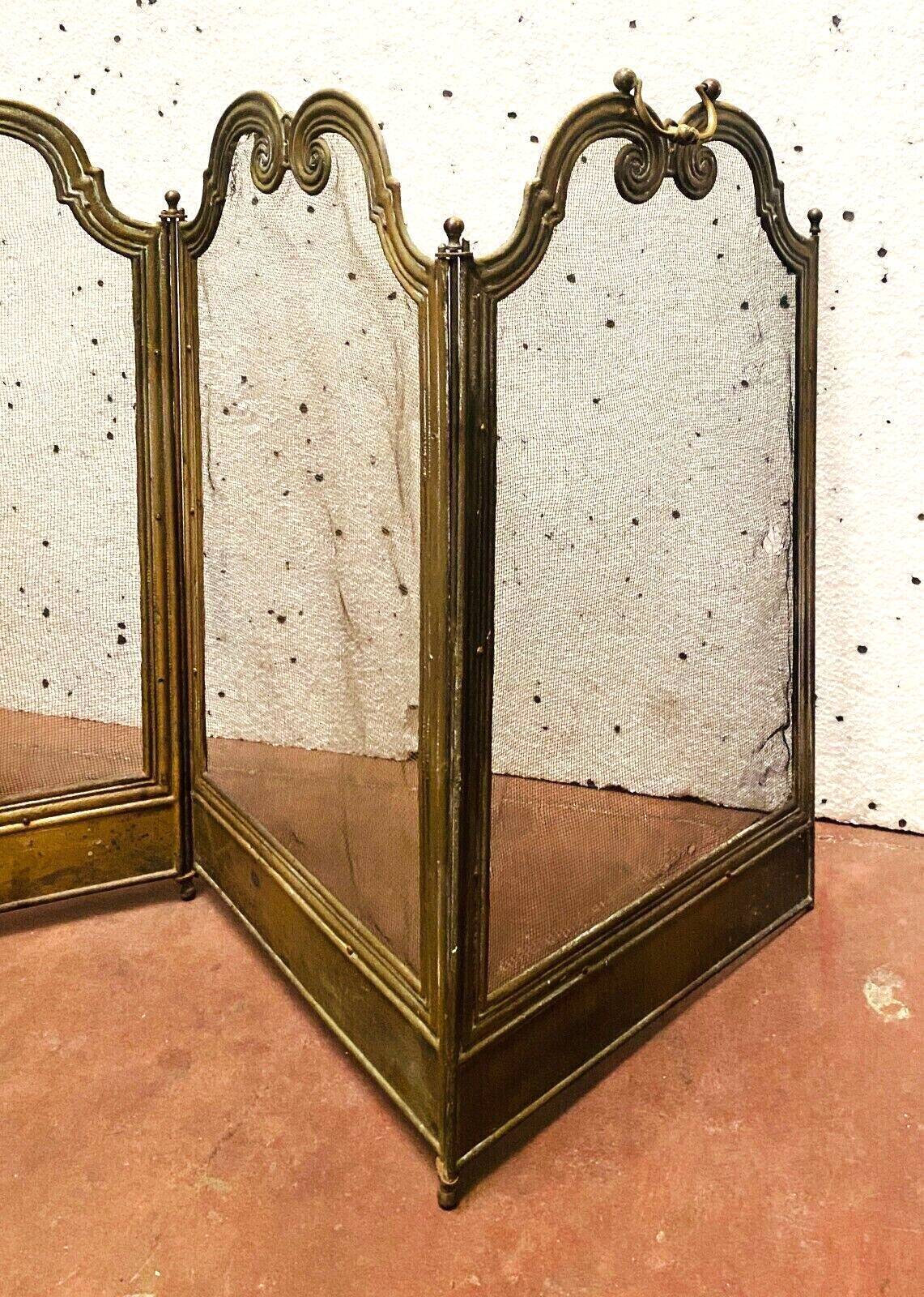 Spark screen has four sheets in brass and braided mesh XX century