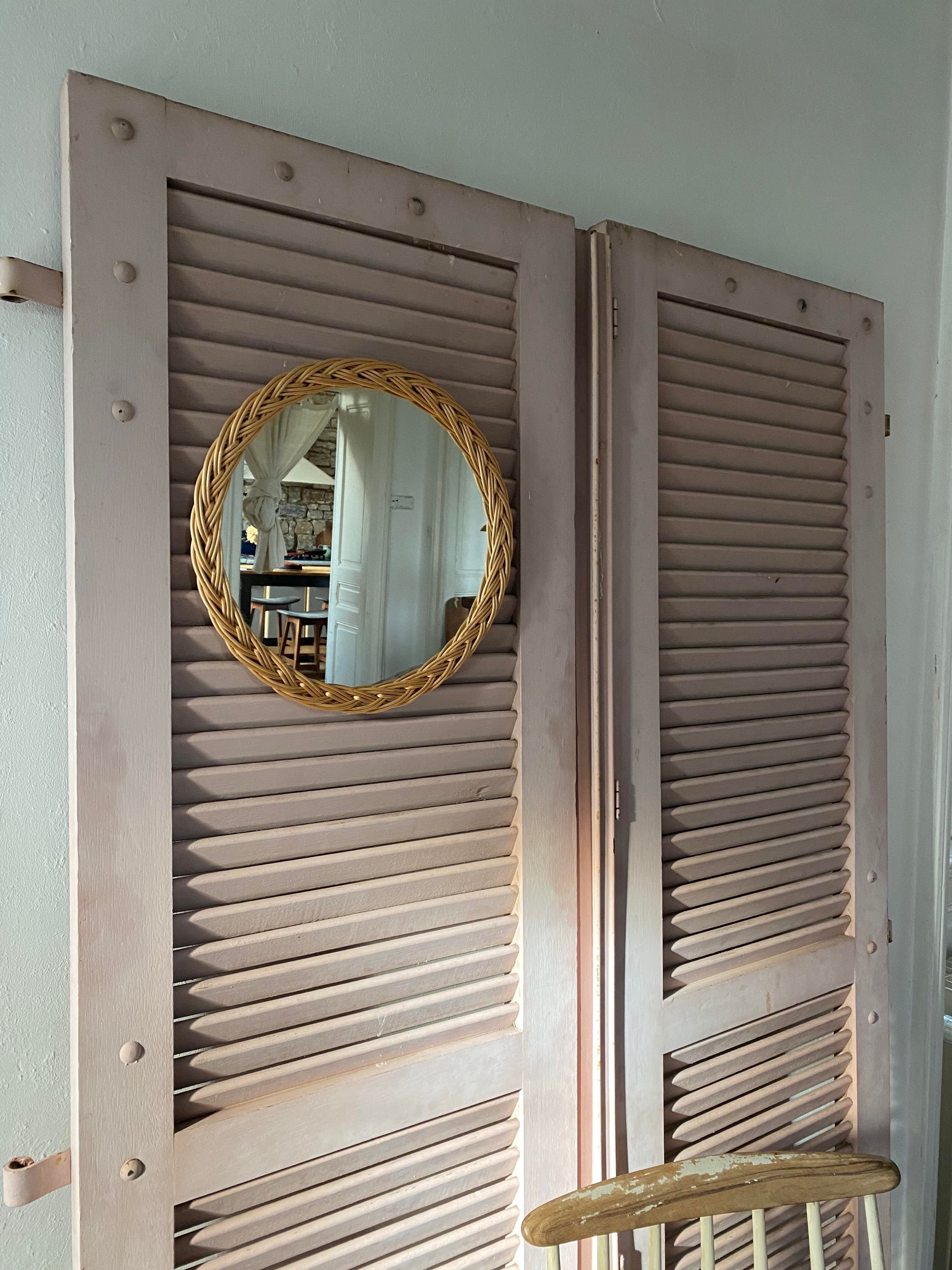 Pair of shutters with wooden shutters in old pink color