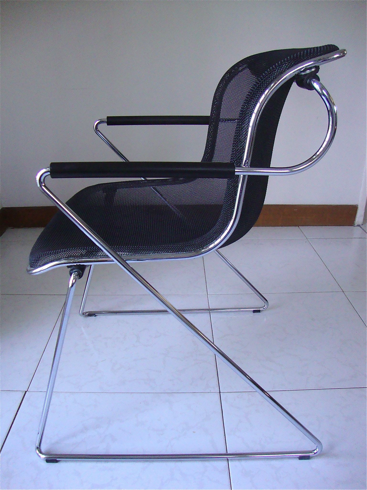 Penelope armchair by Charles Pollock