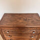 Antique commode with carved relief