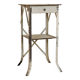 Painted metal side table, patinated white, with a drawer and two shelves