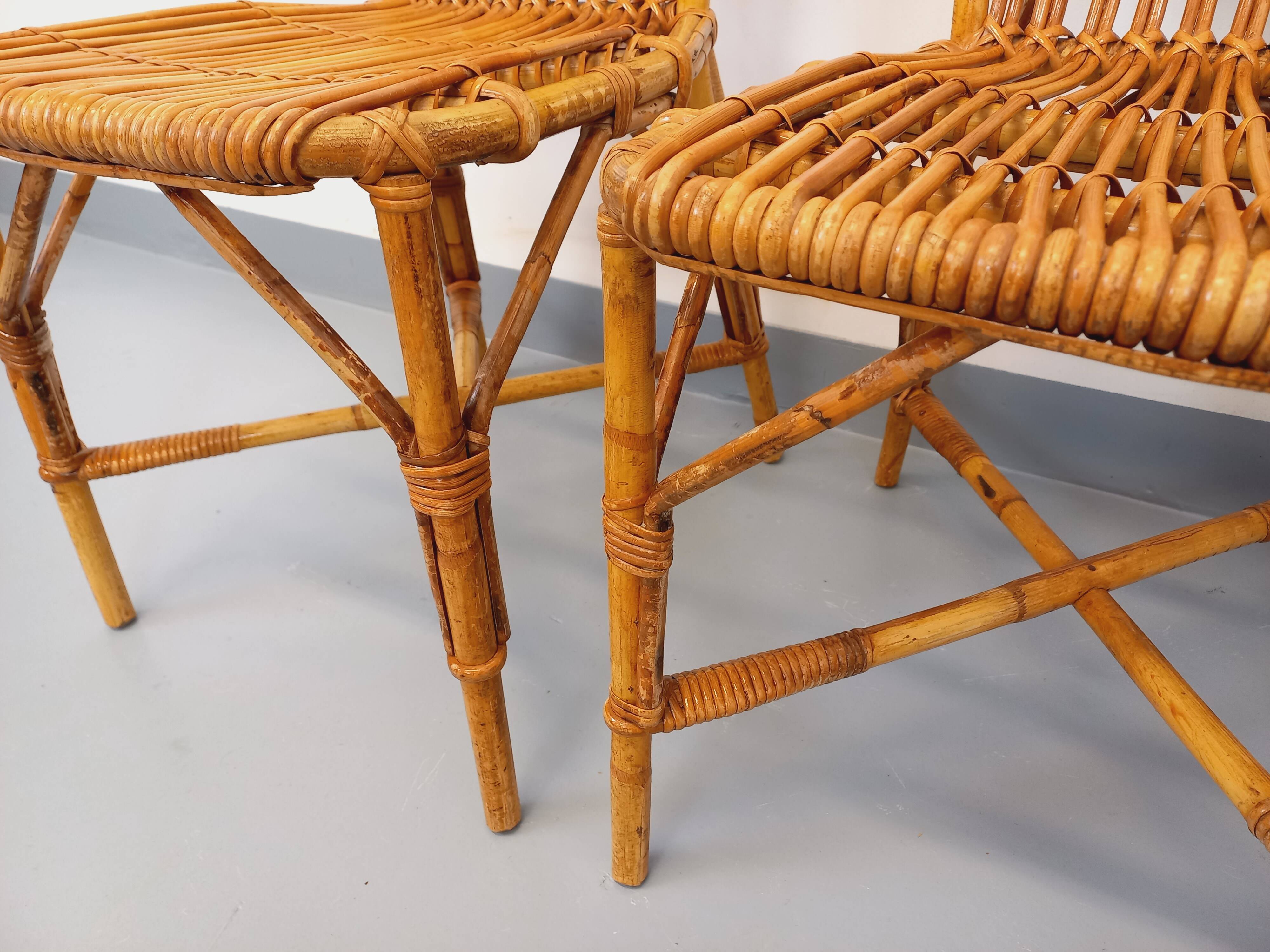 Set of 4 vintage Audoux Minet rattan chairs from the 1950s and 60s.