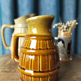 Two pitchers and a small original king beer mug