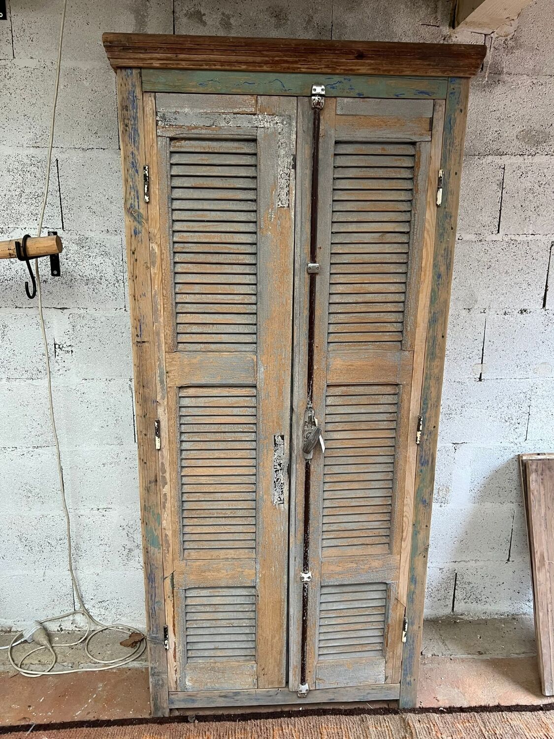 Wooden shuttered wardrobe