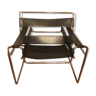 Chair in black leather and metal