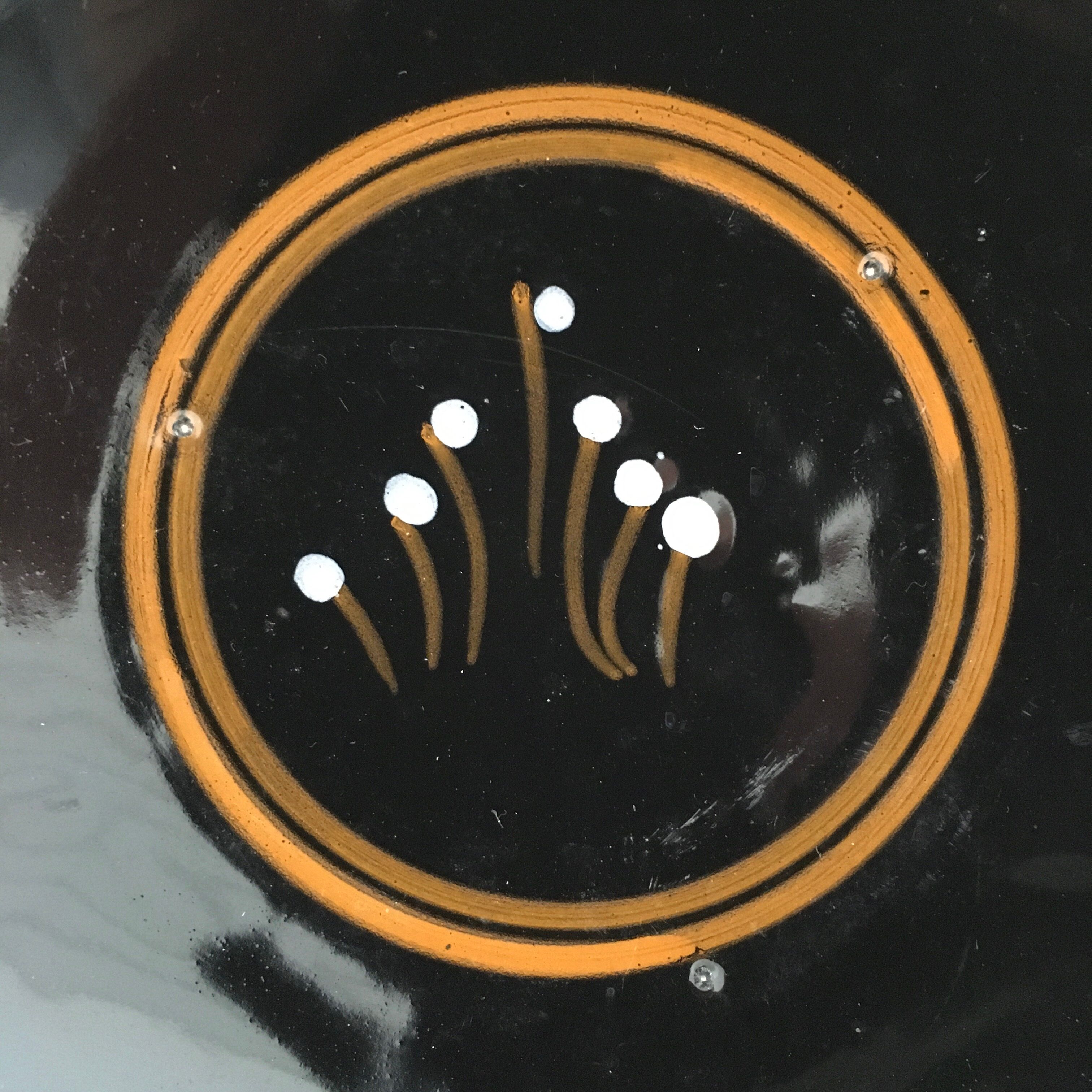 Set of 3 black decorative deep plates.